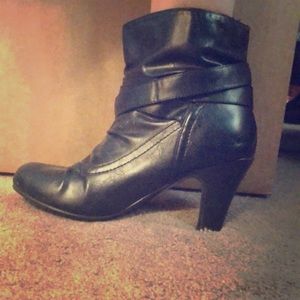 Heeled black booties